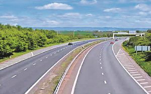 green highway with plastic waste