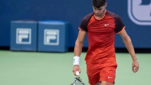 Carlos Alcaraz repeatedly smashed his racket in a rare show of frustration