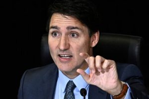 Justin Trudeau turns back