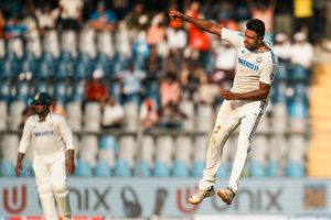 Ashwin celebrates after wicket in Mumbai.