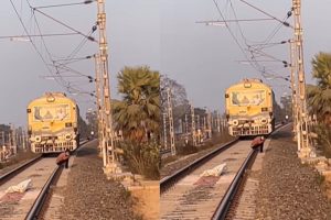 lover talking girlfriend sitting on railway track